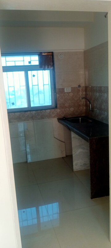 Kitchen in 1 BHK Apartment at Bindra Complex, Andheri East – for Rent