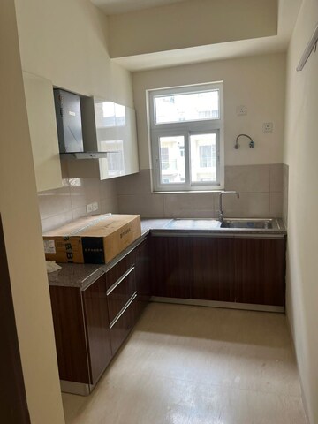Kitchen in 3 BHK Apartment at Puri Anand Villas Phase II, Sector 81 – for Rent
