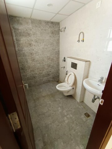 Bathroom in 3 BHK Apartment at Puri Anand Villas Phase II, Sector 81 – for Rent