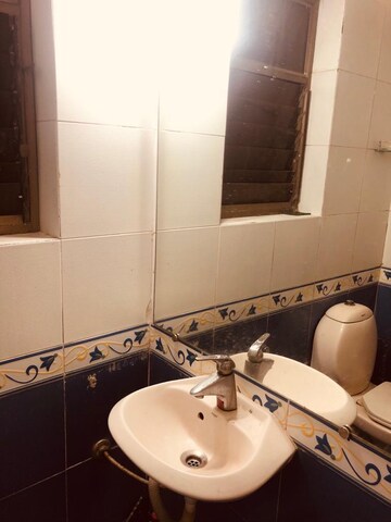 Bathroom in 2 BHK Apartment at Castle Rock Apartment, Bhakti Park – for Sale