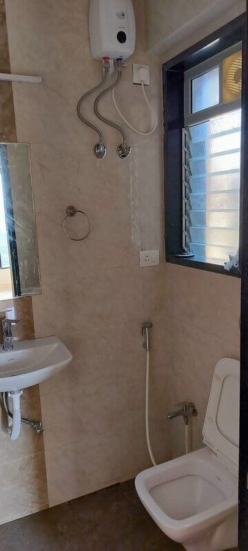 Bathroom in 2 BHK Apartment at Karmvir Avant Sky Villa, Goregaon East – for Rent
