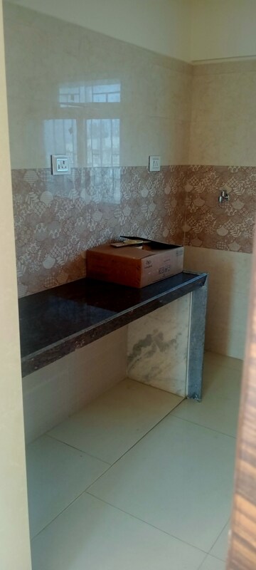Kitchen in 1 BHK Apartment at Bindra Complex, Andheri East – for Sale