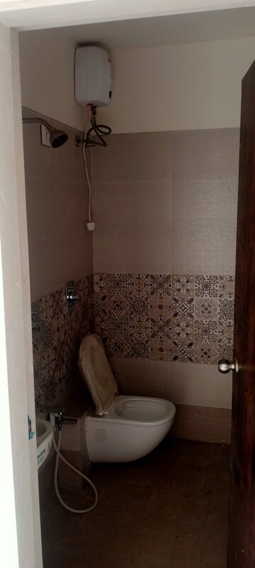 Bathroom in 1 BHK Apartment at Bindra Complex, Andheri East – for Sale