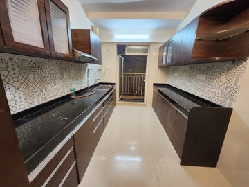 Kitchen in 2 BHK Apartment at Dosti Group Imperia, Manpada – for Rent