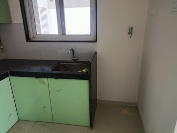 Kitchen in 2 BHK Apartment at Ashar Axis, Majiwada – for Rent