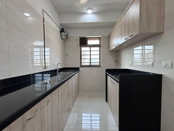 Kitchen in 1 BHK Apartment at Sheth Vasant Oasis, Andheri East – for Rent