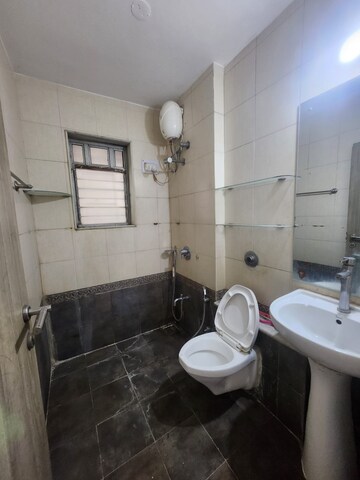 Bathroom in 3 BHK Apartment at Soham Garden, Manpada – for Sale
