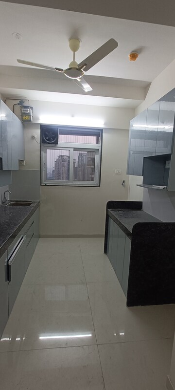 Kitchen in 2 BHK Apartment at Ashar Axis, Majiwada – for Rent