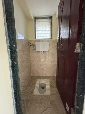 Bathroom in 1 BHK Apartment at Lodha Crown Taloja Quality Homes, Dombivli East – for Rent