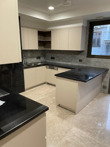 Kitchen in 4 BHK Apartment at Vasant Vihar – for Sale