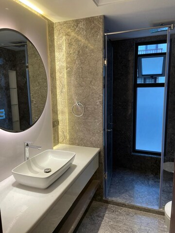 Bathroom in 4 BHK Apartment at Vasant Vihar – for Sale