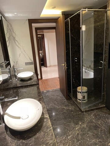 Bathroom in 4 BHK Apartment at Vasant Vihar – for Sale