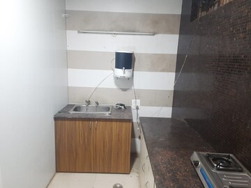Kitchen in 1 BHK Apartment at The Galaxy Hotel, Sector 15 – for Rent