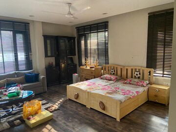 Bedroom in 4 BHK Apartment at Vasant Vihar – for Rent