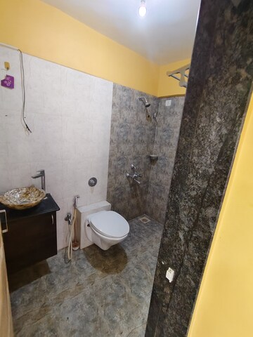 Bathroom in 1 BHK Apartment at Cirrus CHSL Cosmos Paradise, Vasant Vihar – for Rent