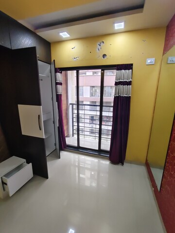 Living Room in 1 BHK Apartment at Cirrus CHSL Cosmos Paradise, Vasant Vihar – for Rent