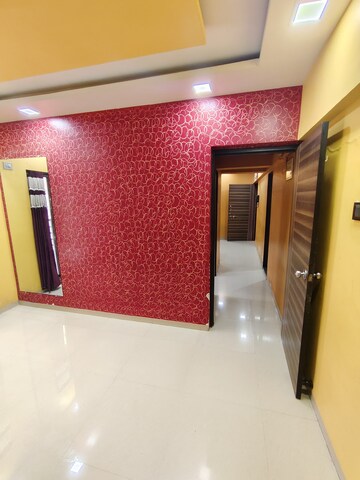 Living Room in 1 BHK Apartment at Cirrus CHSL Cosmos Paradise, Vasant Vihar – for Rent