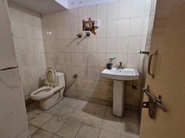 Bathroom in 2 BHK Apartment at Milan Vihar 1 RWA, Indrapuram – for Sale