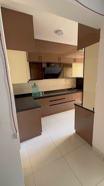 Kitchen in 2 BHK Apartment at Salarpuria Sattva Exotic, Kogilu – for Rent