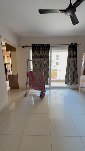 Living Room in 2 BHK Apartment at Salarpuria Sattva Exotic, Kogilu – for Rent