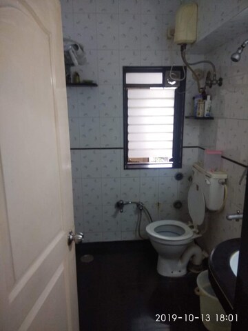 Bathroom in 4 BHK Apartment at Khar West – for Sale