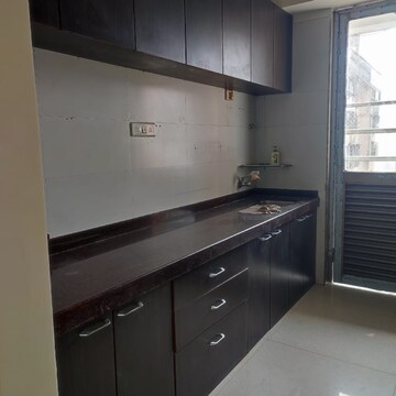 Kitchen in 3 BHK Apartment at Shreepati Group Castle, Khetwadi – for Rent