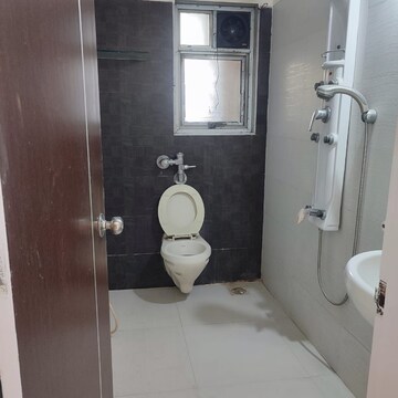 Bathroom in 3 BHK Apartment at Shreepati Group Castle, Khetwadi – for Rent