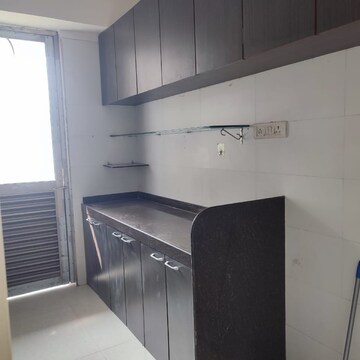 Kitchen in 3 BHK Apartment at Shreepati Group Castle, Khetwadi – for Rent
