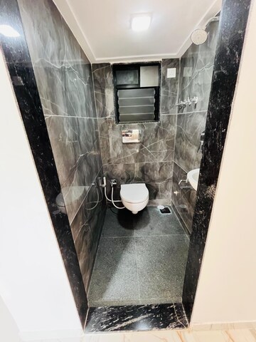 Bathroom in 1 BHK Apartment at RNA NG Aroma, Navghar – for Sale