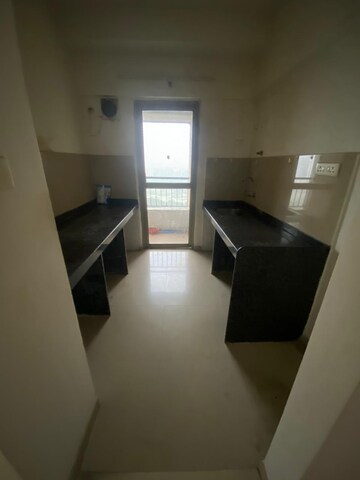 Kitchen in 1 BHK Apartment at Lodha Palava Downtown, Dombivli East – for Rent