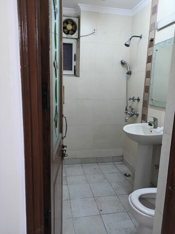 Bathroom in 3 BHK Apartment at Sector 6, Dwarka – for Rent