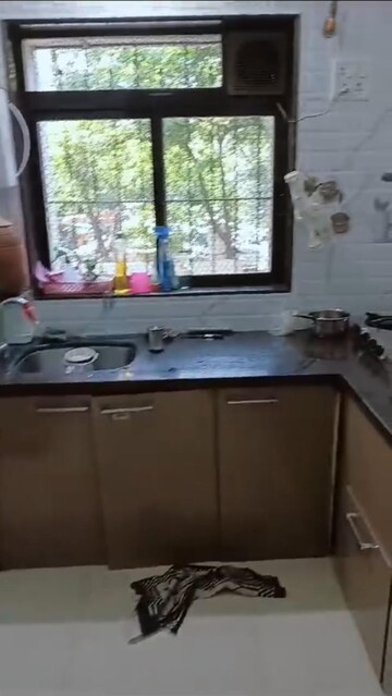 Master Bedroom in 1 BHK Apartment at Goregaon West – for Sale