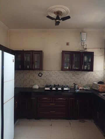 Kitchen in 3 BHK Apartment at Dhakoli Village – for Sale