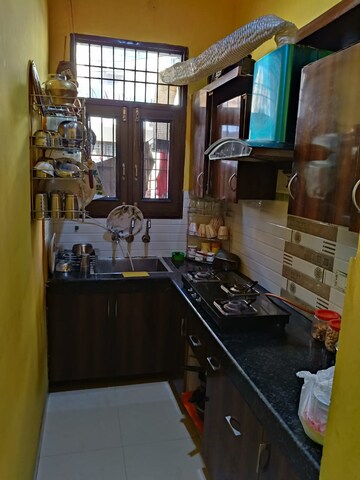 Kitchen in 3 BHK Apartment at Dhakoli Village – for Sale