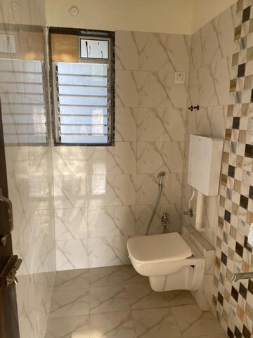 Bathroom in 2 BHK Apartment at Dharti Presidio, Malad West – for Rent