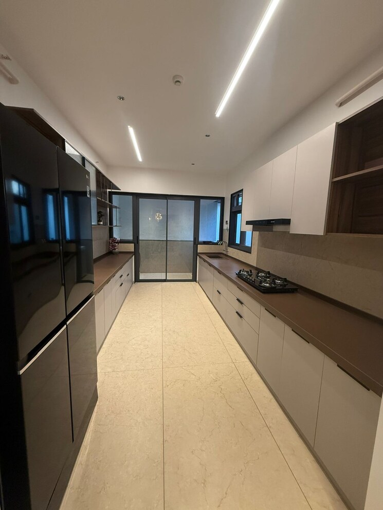 Kitchen, unique-envogue 4 Bedroom 1935 Sq.Ft. Apartment In Mundhwa Pune 8076295