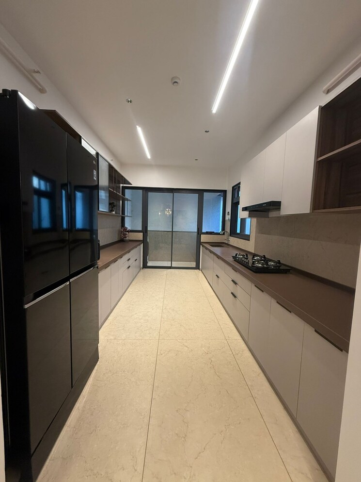 Kitchen, unique-envogue 4 Bedroom 1935 Sq.Ft. Apartment In Mundhwa Pune 8076295