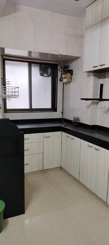 Kitchen in 1 BHK Apartment at Concord CHS, Andheri West – for Rent