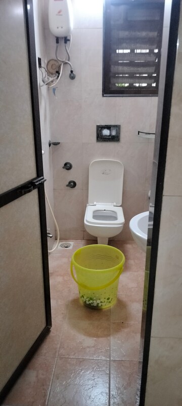 Bathroom in 1 BHK Apartment at Concord CHS, Andheri West – for Rent