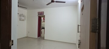 Living Room in 1 BHK Apartment at Lodha Palava City, Dombivli East – for Rent