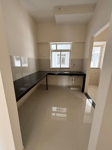 Kitchen in 2 BHK Apartment at Pegasus Megapolis Serenity, Hinjewadi – for Rent