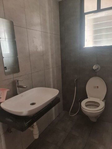 Bathroom in 3 BHK Apartment at Pride World City Kingsbury, Charholi Budruk – for Rent