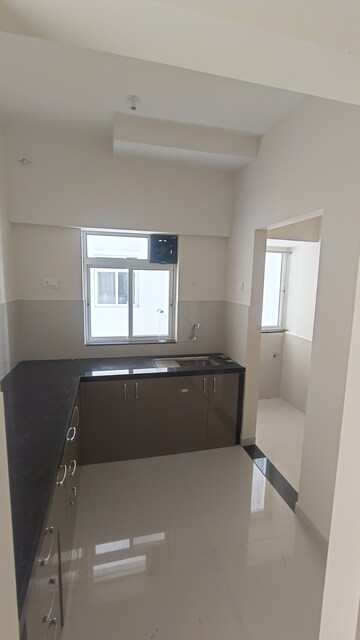 Kitchen in 2 BHK Apartment at Pegasus Megapolis Serenity, Hinjewadi – for Rent