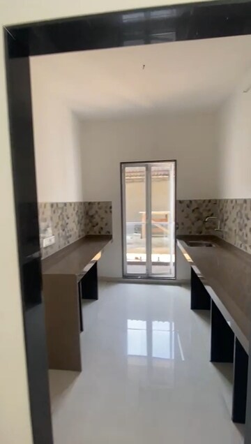 Kitchen in 3 BHK Apartment at Davakhar Sereno, Kalyan East – for Sale