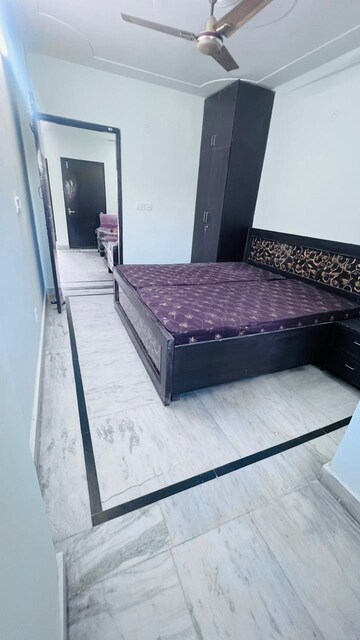 Bedroom in 3 BHK Builder Floor at Ansal Sushant Lok I, Sector 43 – for Rent