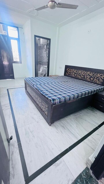 Bedroom in 3 BHK Builder Floor at Ansal Sushant Lok I, Sector 43 – for Rent
