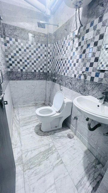 Bathroom in 3 BHK Builder Floor at Ansal Sushant Lok I, Sector 43 – for Rent