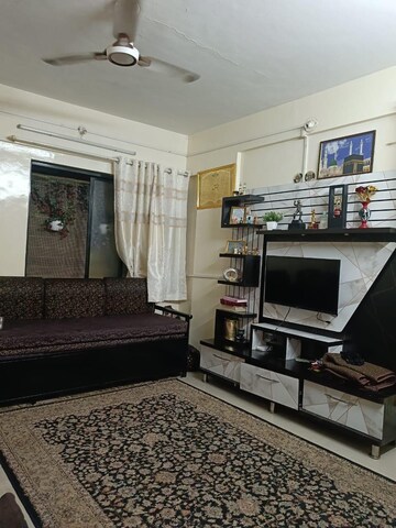 Living Room in 1.5 BHK Apartment at Modern Pride Apartment, Ganesh Peth – for Sale