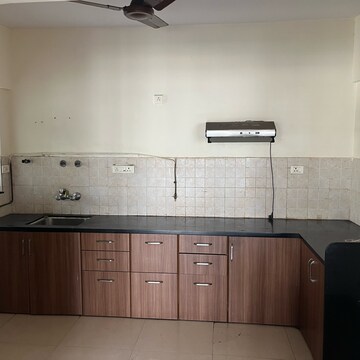 Kitchen in 3 BHK Apartment at Brahma Suncity, Wadgaon Sheri – for Rent