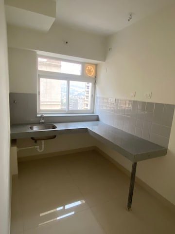 Kitchen in 2 BHK Apartment at Shapoorji Pallonji Alpine, Kandivali East – for Rent